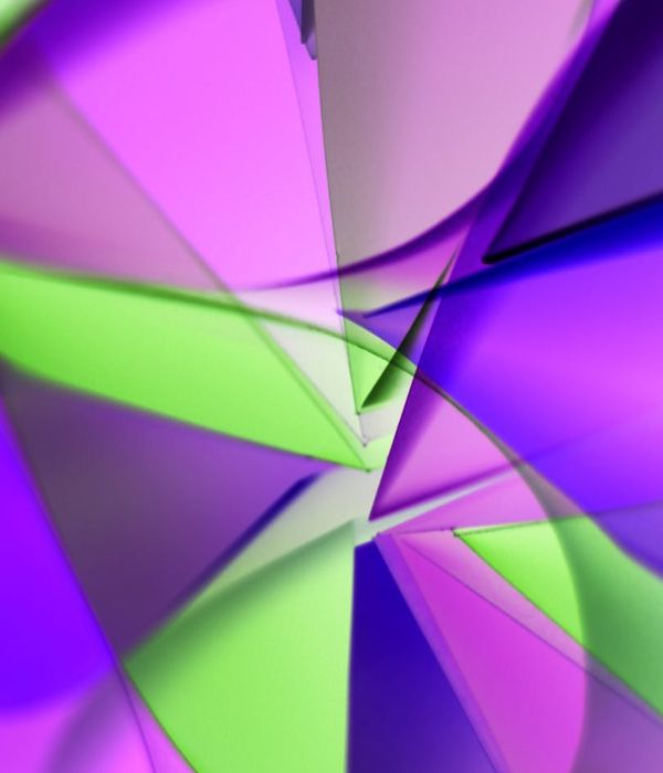 Abstract green geometric shapes representing visual clarity and focus